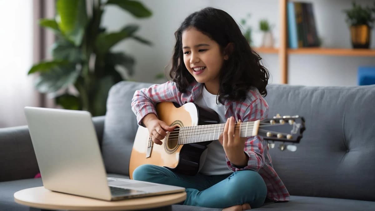 Student playing guitar