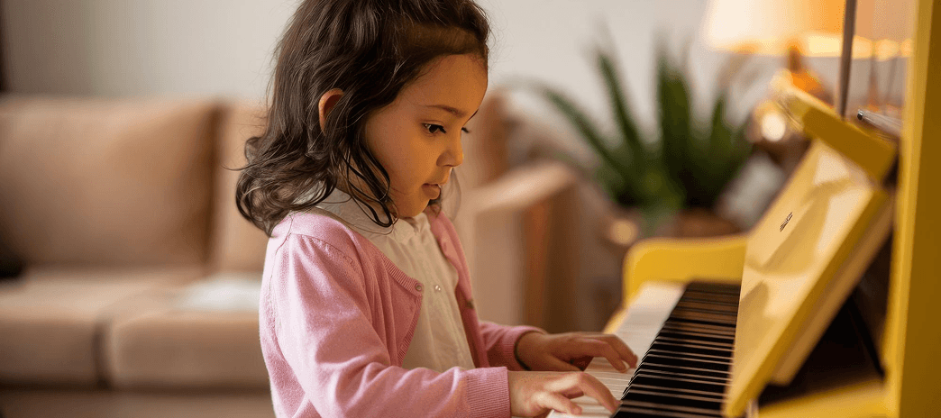 Student playing piano