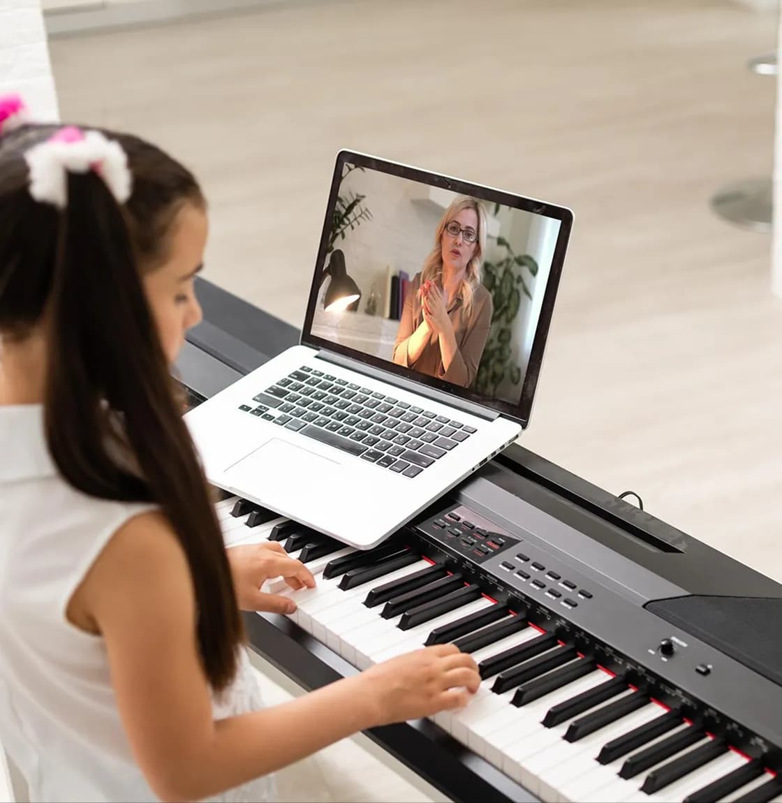 Student learning piano