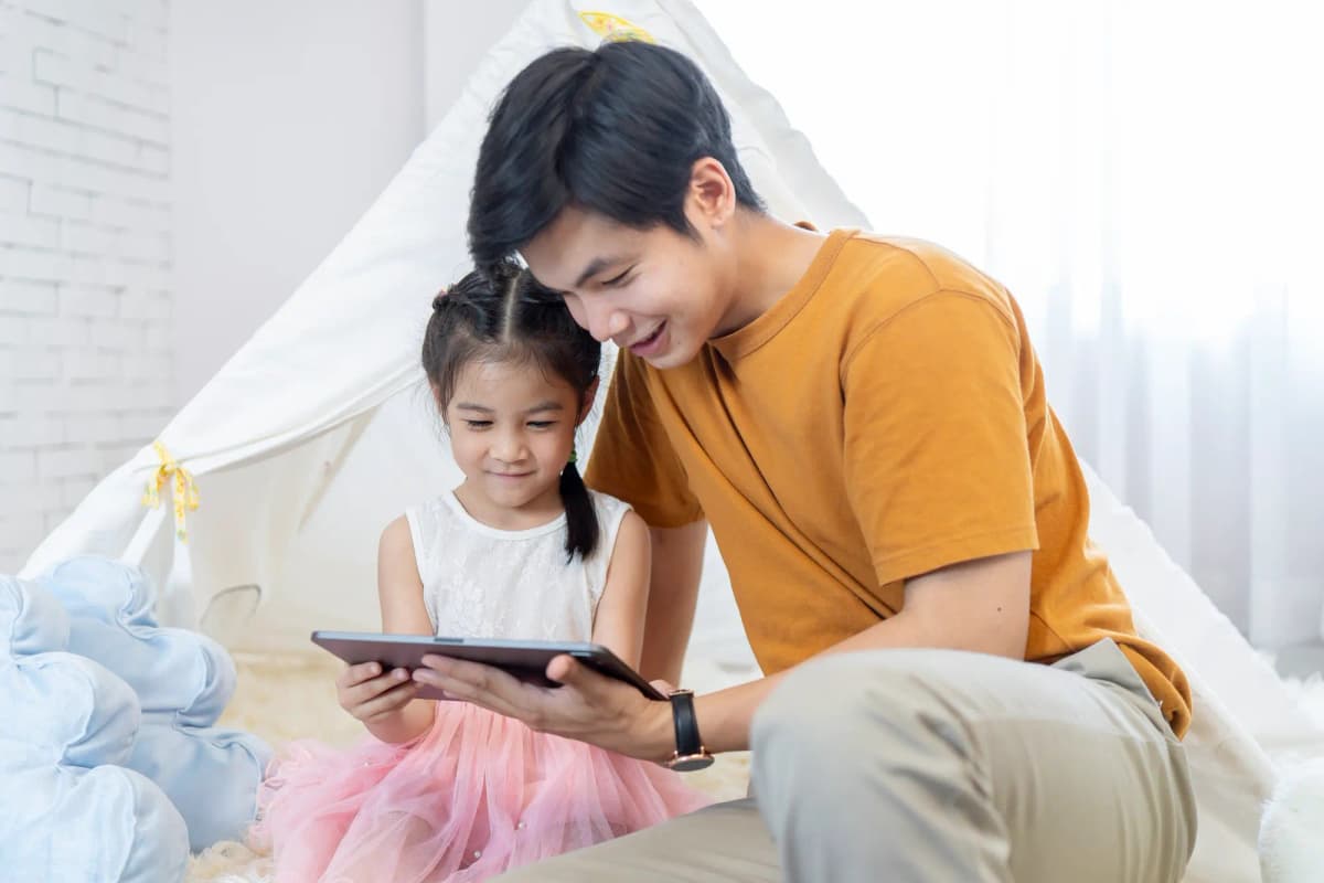 Teacher helping students in classroom